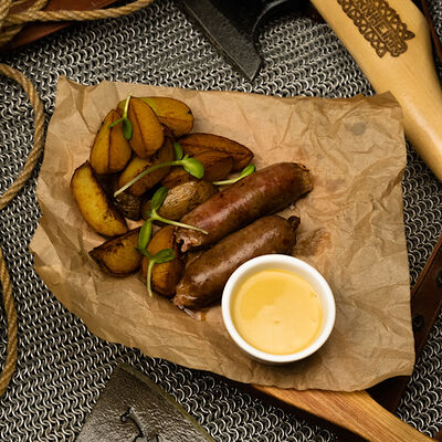 Купаты свиные с картофелем беби в Бар Бьёрнхейм Bjornheimr по цене 460 ₽