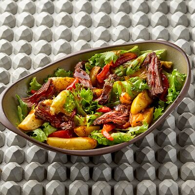 Салат со стейком, жаренным на углях, и печеными овощами в KITCHEN по цене 990 ₽