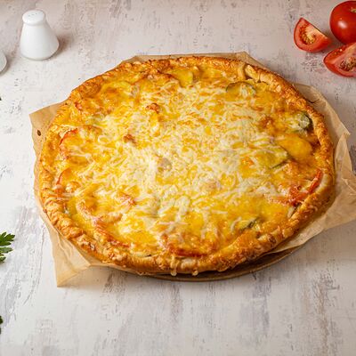 Пицца с ветчиной и сыр в Хлебное место по цене 990 ₽