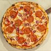 Пицца мясная в Ботаника по цене 1200