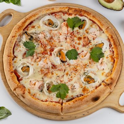 Пицца с морепродуктамив Gusto pizza по цене 950 ₽