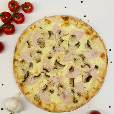 Пицца Ветчина и грибыв Romano pizza по цене 610 ₽