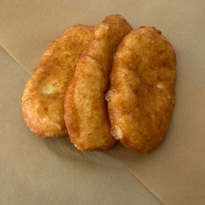 Пирожок с капустой жареный в Пирожковая по цене 100 ₽