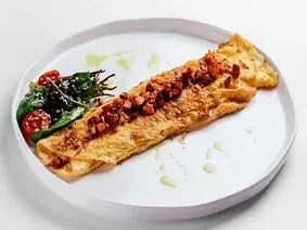 Омлет с копченостями в Тук тук took took по цене 560 ₽