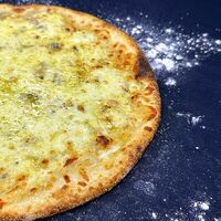 Пицца Кватро Формаджио в Белла Италия