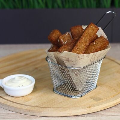 Гренки с чесноком в СЫТЫЙ ГУСЬ по цене 129 ₽