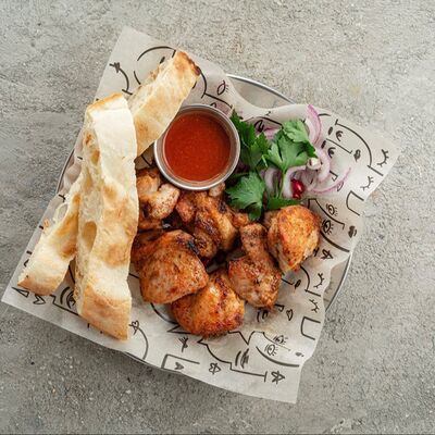 Шашлык из куриного бедра в Georgiani Пекарня и Мангал по цене 600 ₽