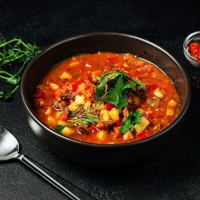 Суп-гуляш из говядины в Кубанские пивоварни по цене 470 ₽