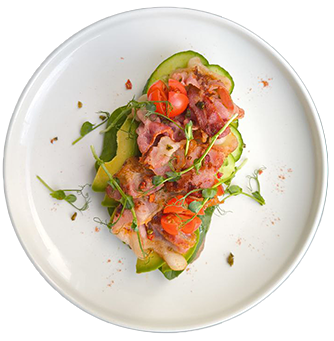 Брускетта с беконом, авокадо и огурцами на солодовом хлебе с клюквой в Панеттоле по цене 495 ₽