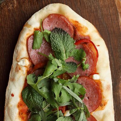 Мини-лахмаджун с телячьей колбасой, томатной пастой и черкесской грушей в Folk по цене 840 ₽