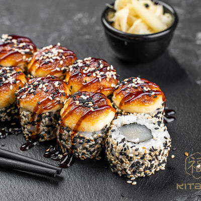 Запеченный ролл в кунжуте с гребешком в Kitana по цене 720 ₽