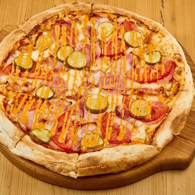 Пицца Домашняя в 4 сыра по цене 940 ₽