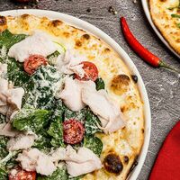 Логотип Tomato Pizza Bar