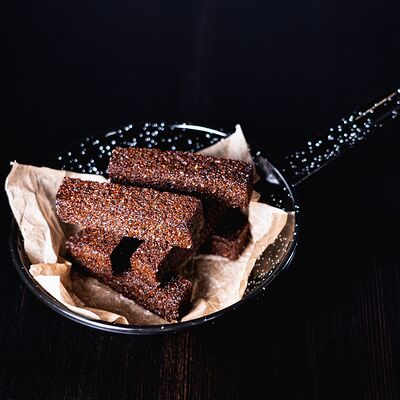 Чесночные гренки в Imna Lounge по цене 320 ₽