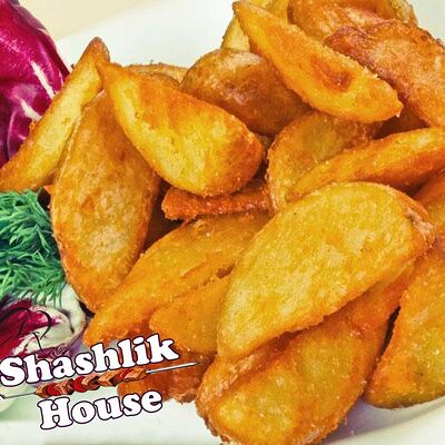 Картофель по-деревенски в Shashlik House по цене 207 ₽