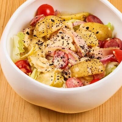 Салат Деревенский в 4 сыра по цене 640 ₽