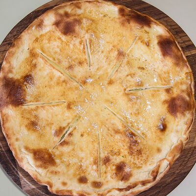 Пирог сырный в The шашлык по цене 920 ₽