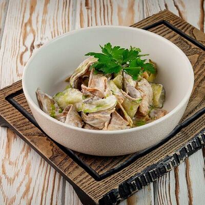 Салат с говяжьим языком в Тут харчо по цене 695 ₽