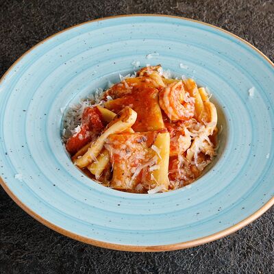 Паккери с морепродуктами в остром томатном соусе в Puberty по цене 870 ₽