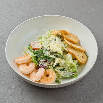 Цезарь с обжаренными креветками в Диккенс по цене 690 ₽