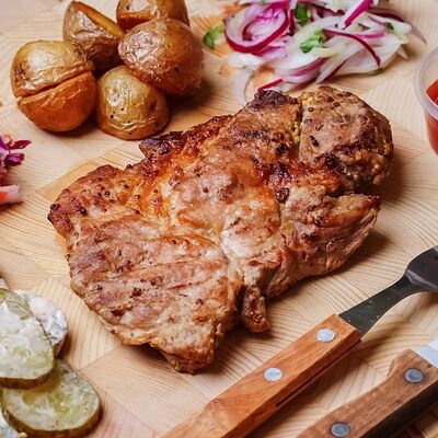 Отбивная из свиной шеи в Steak by Рёберная по цене 580 ₽