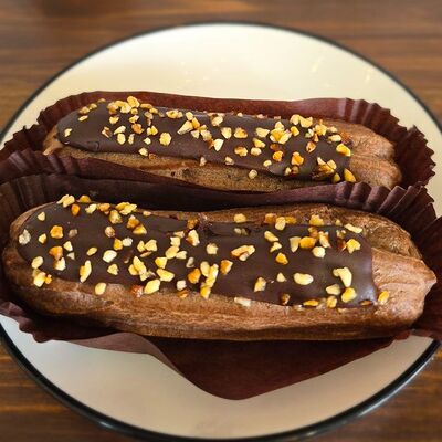 Эклер шоколадный в Симпл по цене 99 ₽