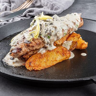 Стейк из филе индейки с картофельными дольками в Duran Bar & Grill по цене 719 ₽