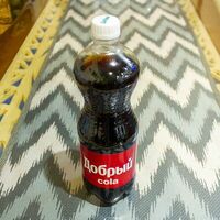 Добрый Cola в Восточный Дворик