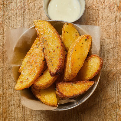 Картофель по-деревенски в Hey Turner BBQ по цене 250 ₽