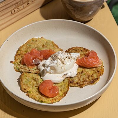 Оладьи из кабачков с лососем и яйцом пашот в Bistro Оstro по цене 950 ₽