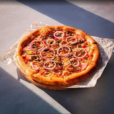 Пицца бургер в Feromon по цене 640 ₽