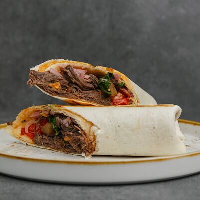 Тортилья с томленой говядиной в Гурман по цене 310 ₽