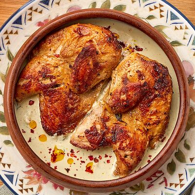 Чкмерули из цыпленка в Нино по цене 950 ₽