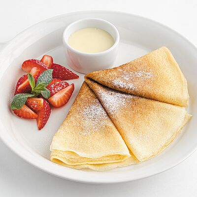 Блинчики с клубникой и сгущенным молоком в Udcкафе Upside Down Cake по цене 560 ₽