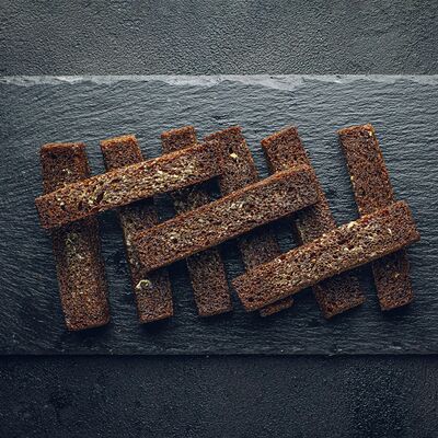 Гренки Чесночные в Рис & Фиш по цене 260 ₽