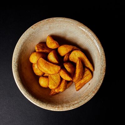 Картофель по-деревенски в Koster по цене 300 ₽