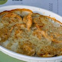 Запеченные пельмени с птицей в грибном соусе в Чемодан