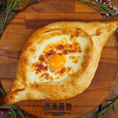 Хачапури по-аджарски в Дади по цене 710 ₽