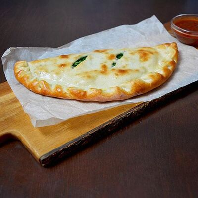 Лепешка с зеленью в Хинкали Хо по цене 250 ₽