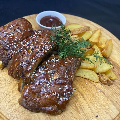 Свиные ребра на гриле в Три перца по цене 790 ₽