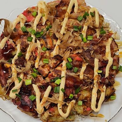 Окономияки японская пицца в GRILL & SUSHIMASTER - ГРИЛЬ и СУШИ МАСТЕР по цене 690