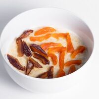 Каша пшенная с финиками и курагой в Bageatteria