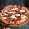 Пицца со страчателлой и томатами в Mama Roma по цене 630