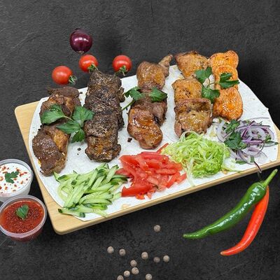 Сет из шашлыков на компанию в Донар на мангале по цене 2100 ₽