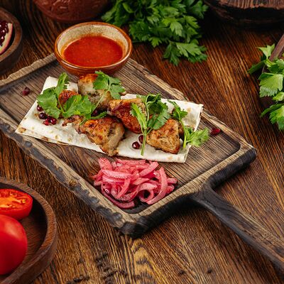 Шашлык из курицы в Гуру по цене 840 ₽