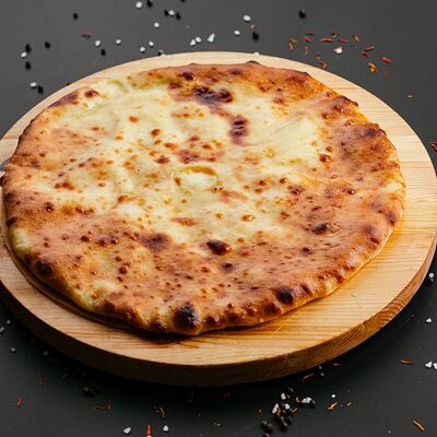 Осетинский пирог Картофджин в Голд Сити по цене 650 ₽