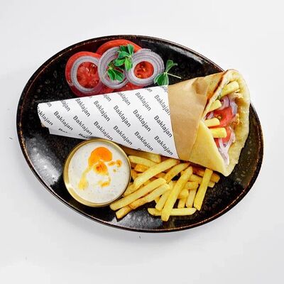 Гирос с курицей в Баклажан по цене 755 ₽