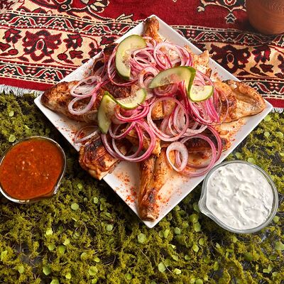 Курица на угляхв Вкусы Дагестана по цене 950 ₽