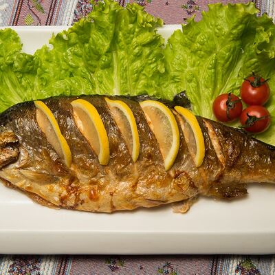 Форель на мангале в Гурман студия по цене 1200 ₽