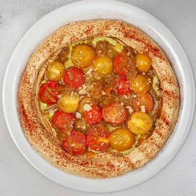 Хумус с карамелизированными томатами в Dizengof/99 по цене 750 ₽